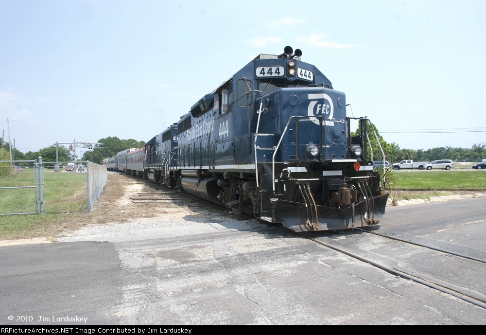 FEC 444 shoves the train over Barrancas Ave